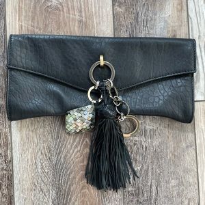 Alexis Hudson black leather clutch